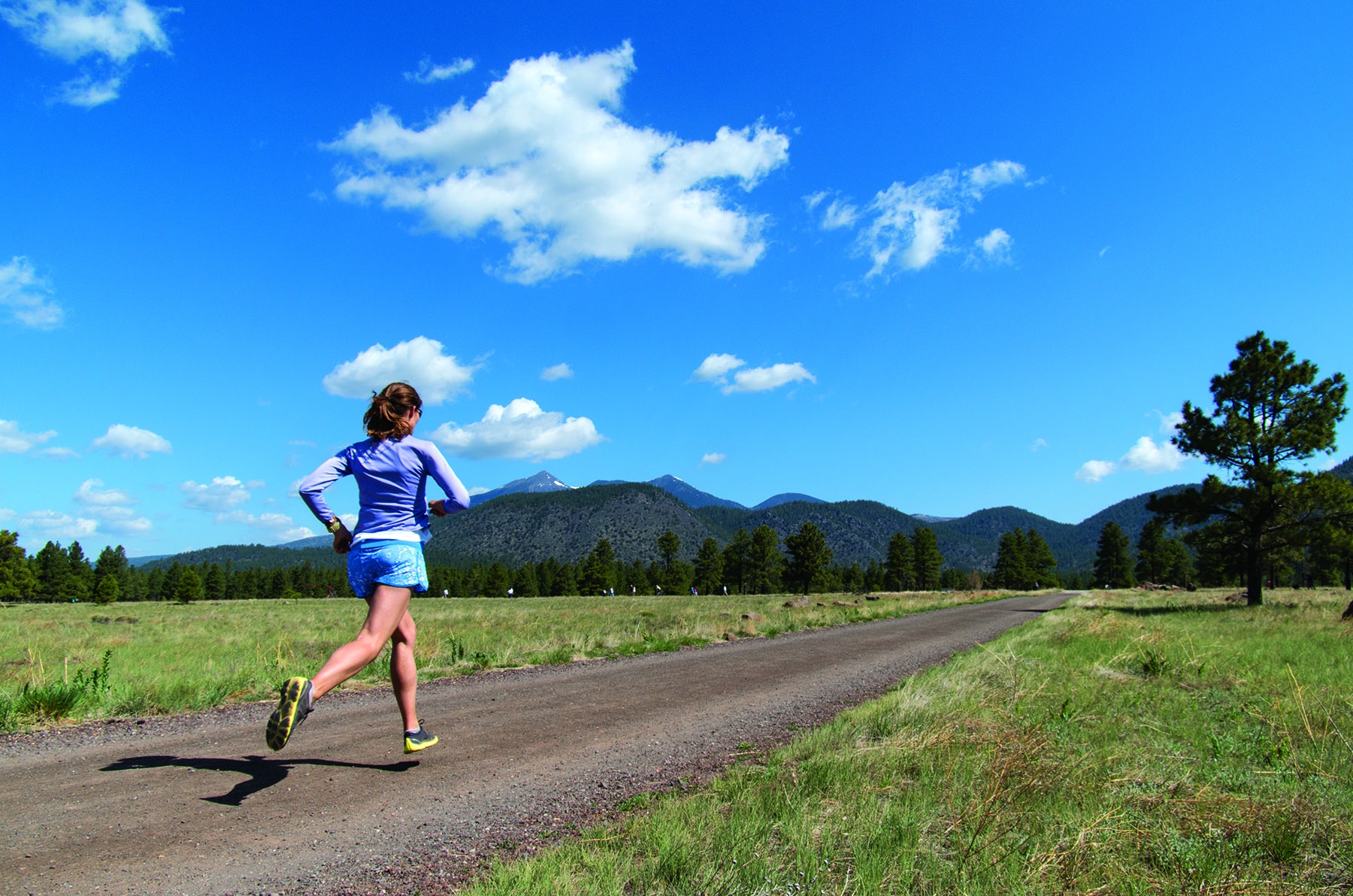Hikers on the Nate Avery Trail at Buffalo Park in Flagstaff with San Francisco Peaks views