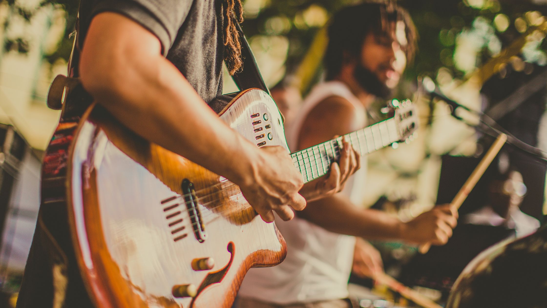 Musicians performing outdoors at the Grateful Festival in Flagstaff