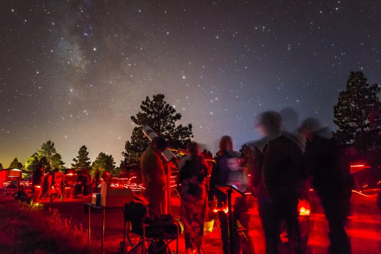 Telescopes under the night sky at the Flagstaff Star Party