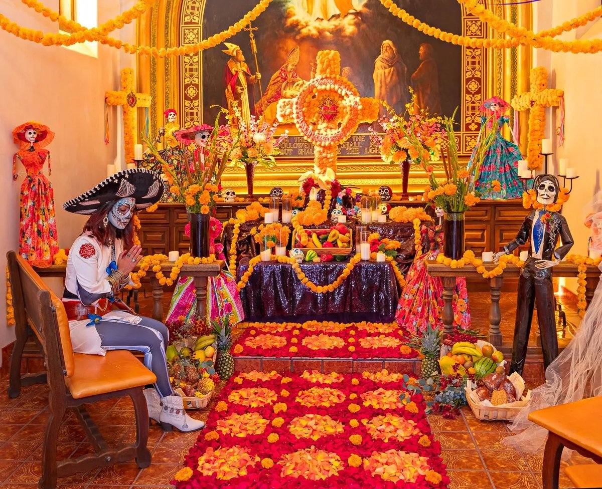 Día de los Muertos altar with marigolds and papel picado at Tlaquepaque in Sedona